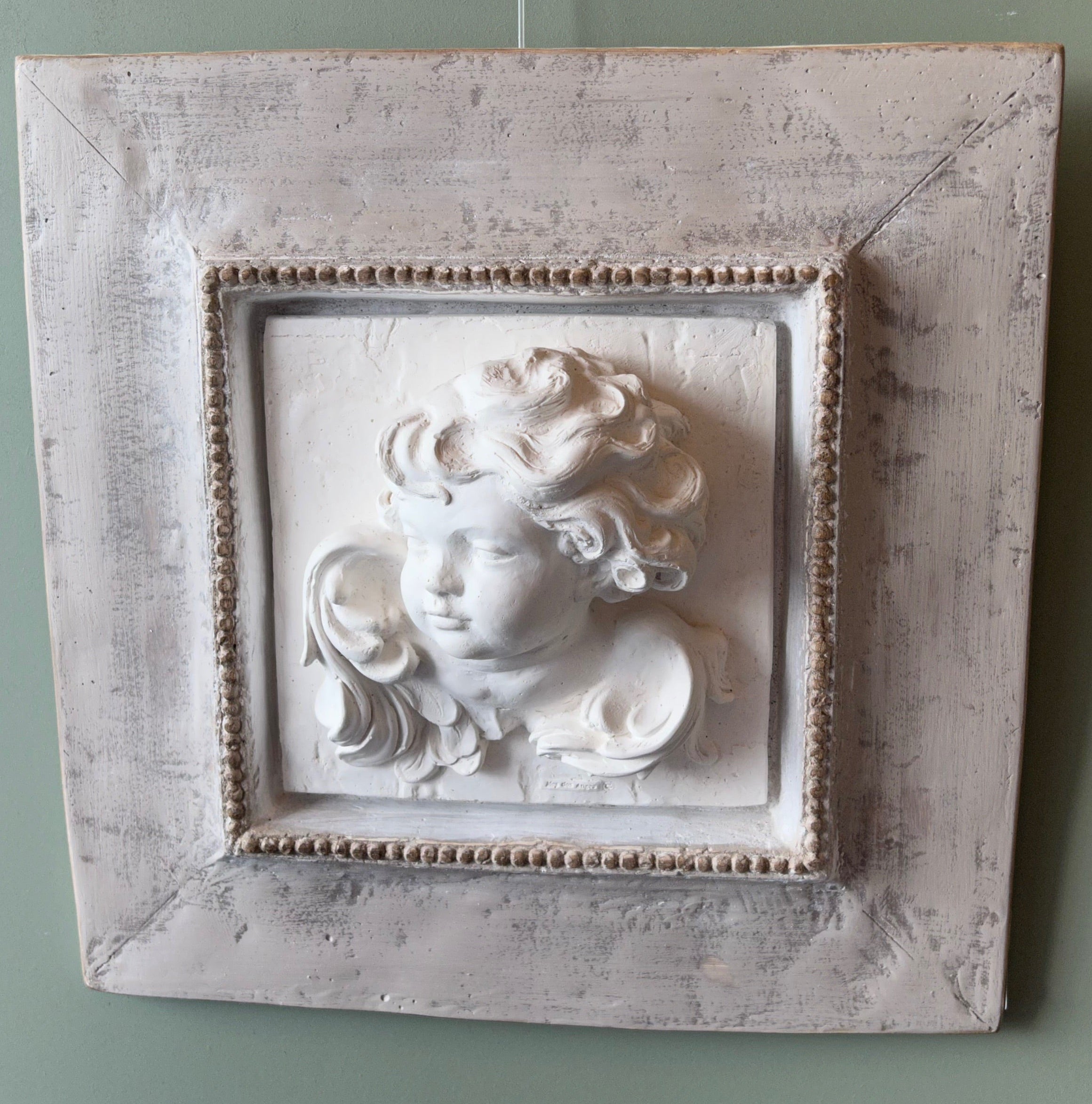 tableau ange en plâtre patiné