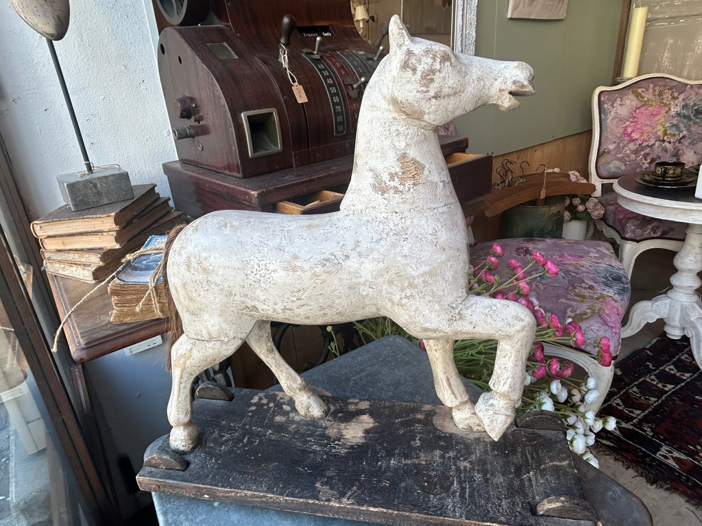 cheval bois roulettes