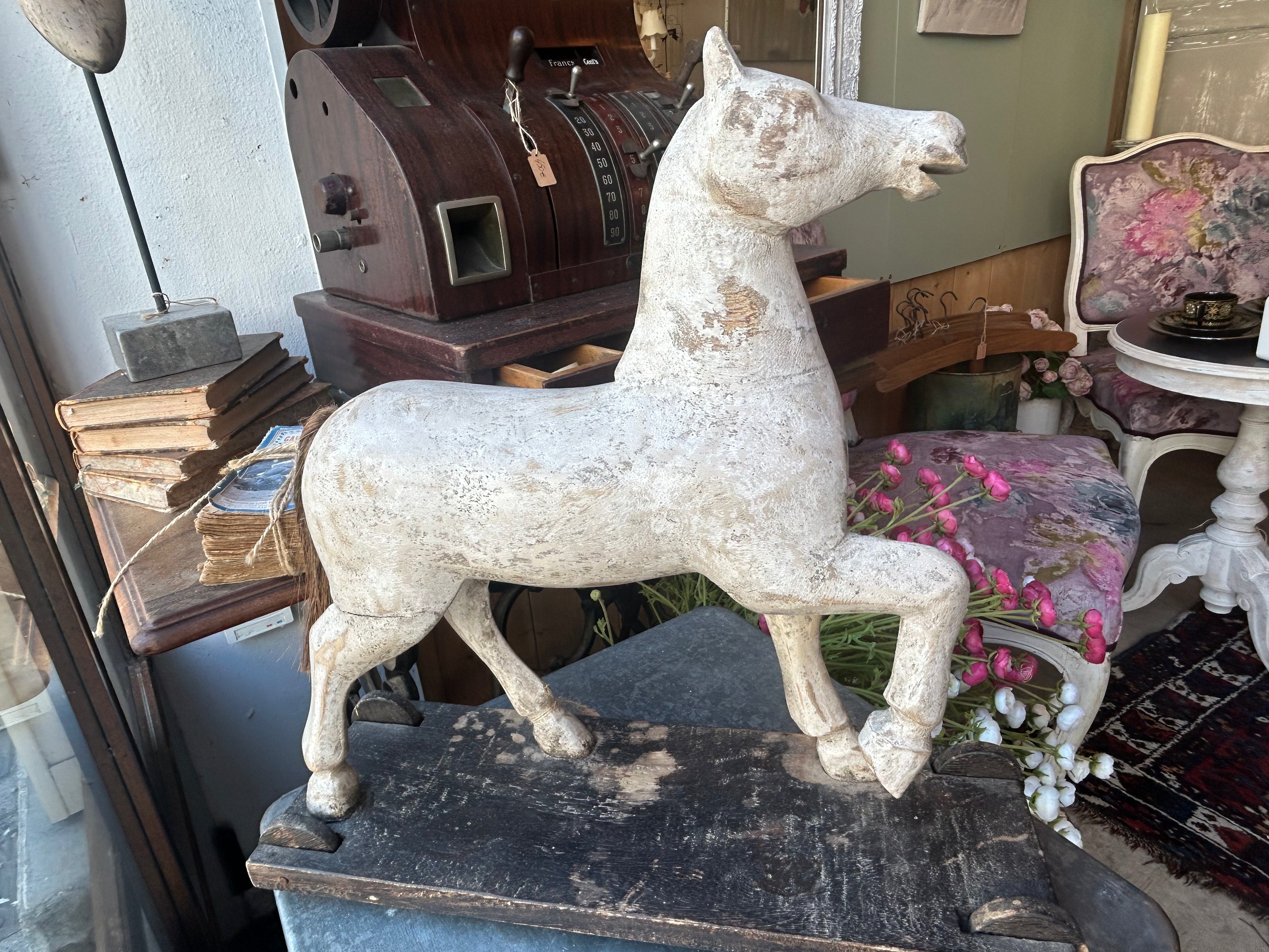 cheval bois roulettes