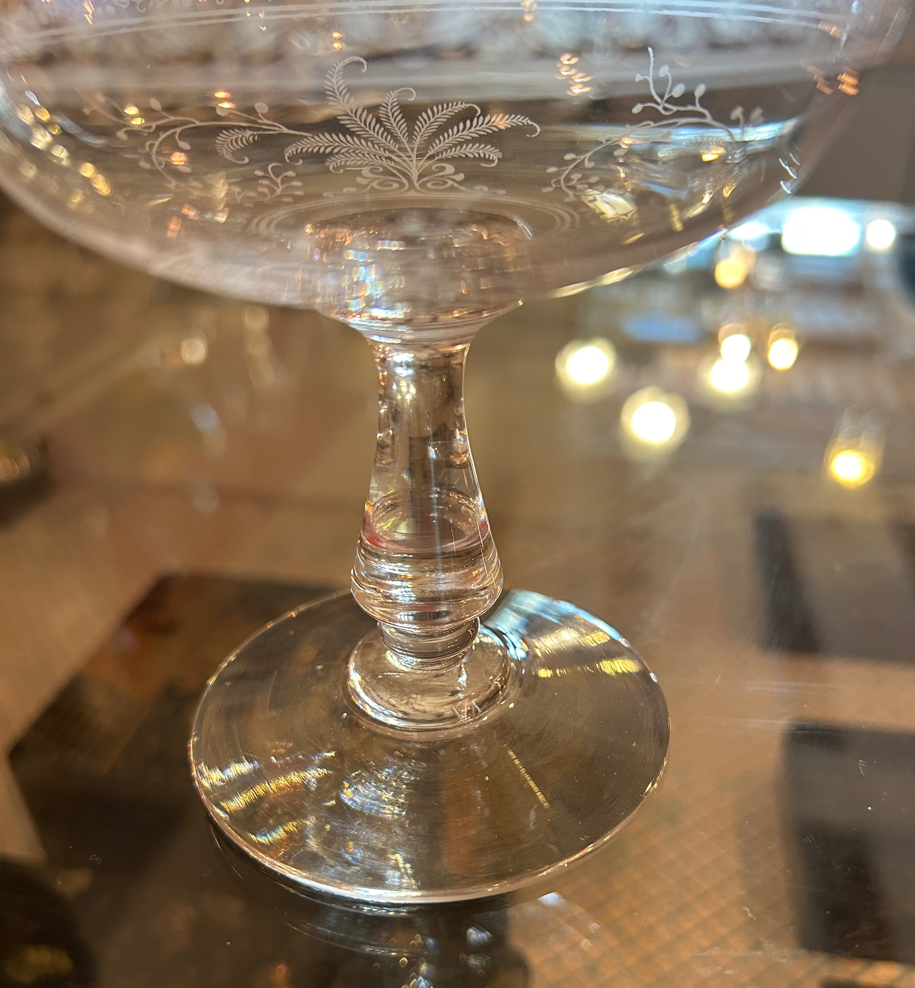 détail coupe champagne fougère